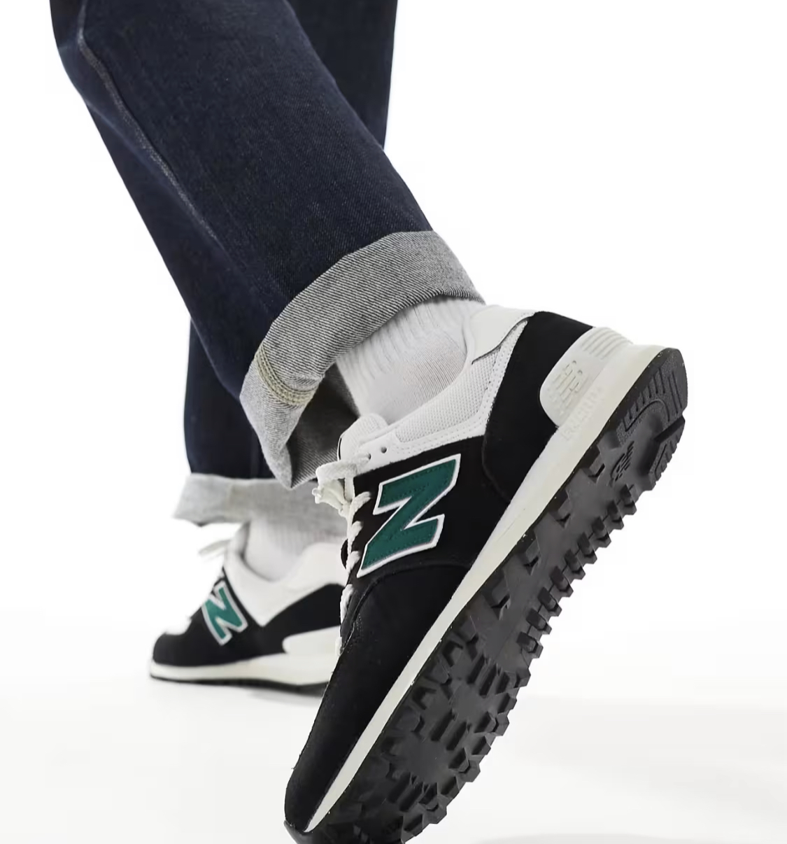 New Balance 574 trainers in black and green